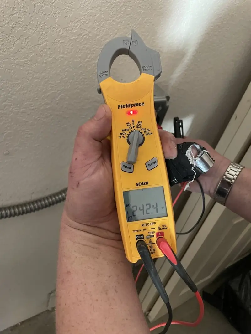 Voltage testing with clamp meter during Aluminum Wiring Replacement in Catalina Foothills